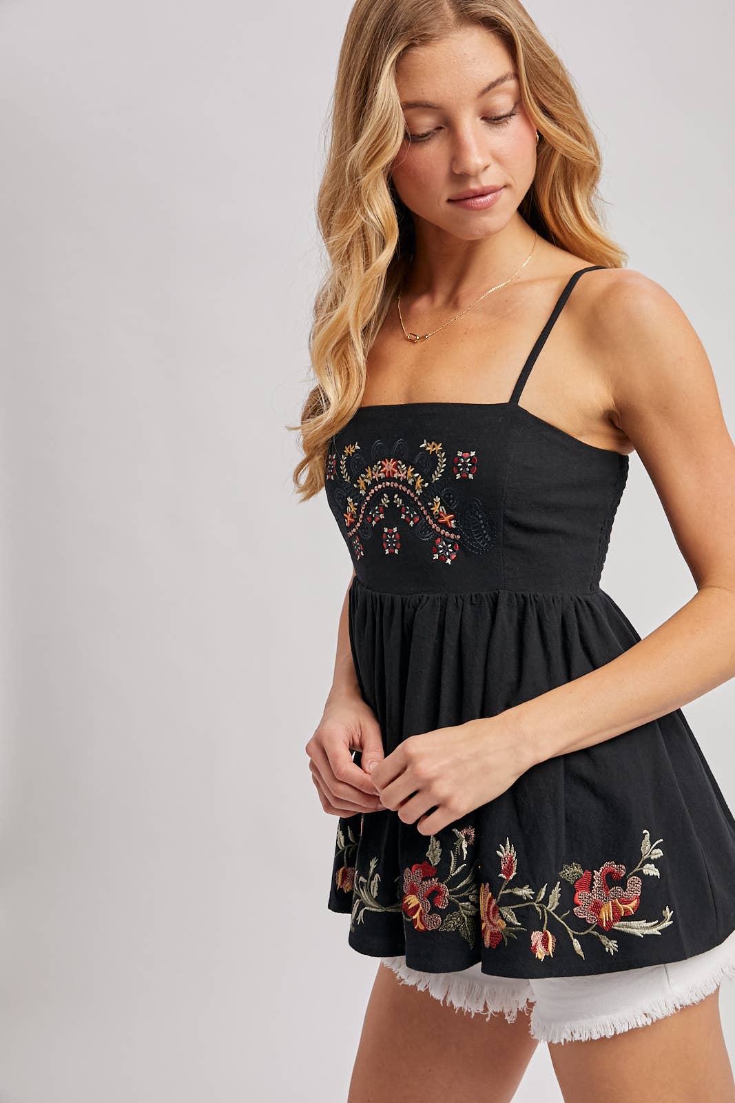 FLORAL EMBROIDERED SLEEVELESS PEPLUM TOP